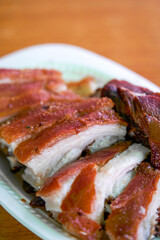 Freshly baked crispy suckling pork, a whole pig with crispy skin