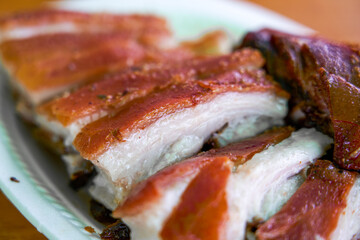 Freshly baked crispy suckling pork, a whole pig with crispy skin