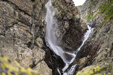 A waterfall in the Velka Zmarzla Valley. Tatra National Park, Slovakia.