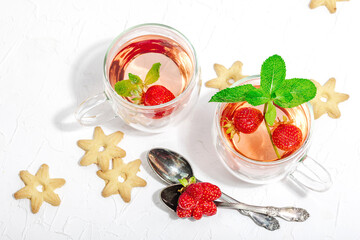 Strawberry tea concept. Good morning concept. Teapot, ripe fruits, healthy beverage