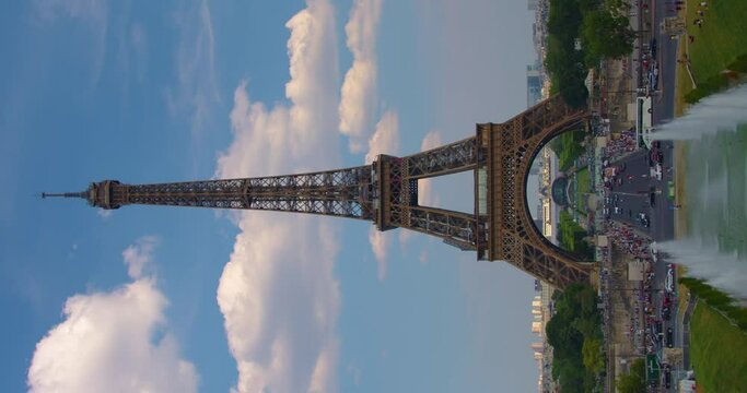 Vertical video famous square with Eiffel tower in the background time lapse. Trocadero and Eiffel tower are the most visited attractions of Paris. Hyperlapse. Cumulus clouds in the background