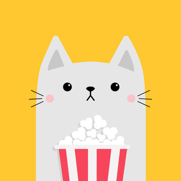 White cat and popcorn box. Cute cartoon funny character. Cinema theater. Film show. Kitten watching movie. Kids print for tshirt notebook cover. Yellow background. Isolated. Flat design