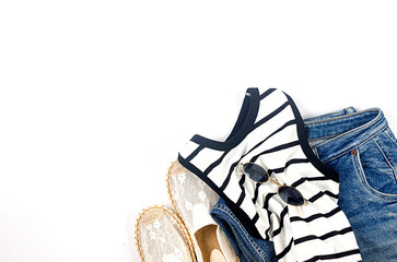 Set of seasonal summer fashion woman clothes, top view. Women's summer outfit.