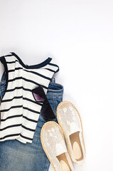 Set of seasonal summer fashion woman clothes, top view. Women's summer outfit.