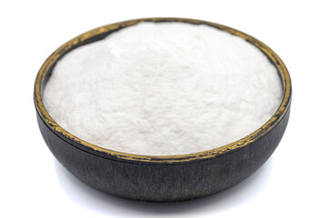 Sodium bicarbonate or baking soda isolated on white background. Sodium bicarbonate powder in bowl. Close up