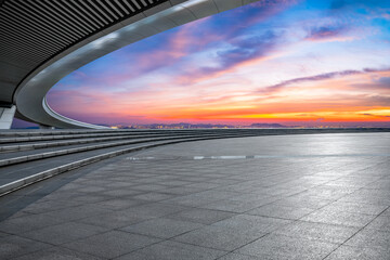 Empty square floors and skyline with colorful sky clouds at sunset