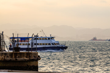 Obraz premium Passenger cruise ship on Hong Kong sea