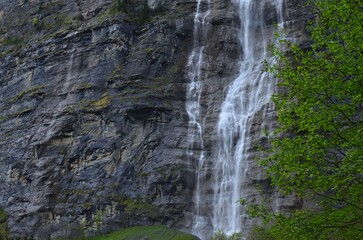 Fototapeta na wymiar Picturesque view of beautiful waterfall in mountains