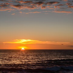 Naklejka na ściany i meble sunset at the beach, sunrise, ocean, water, nature, AI generated