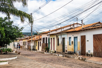 Fototapeta na wymiar Street with colorful houses in colonial style at Palmeiras in Vale do Capao in Chapada Diamantina, Bahia, Brazil