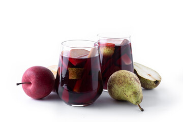 Autumn sangria with pear and apple isolated on white background.