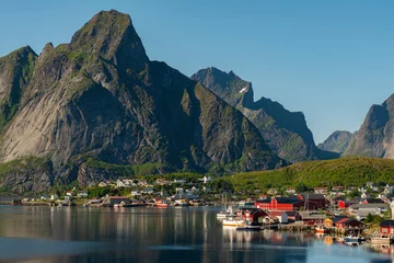 Foto auf Alu-Dibond The most famous fishing village Reine on Lofoten islands, Nordland, Norway. Amazing nature with dramatic mountains and peaks, open sea and bays of Lofoten islands. © Lizaveta
