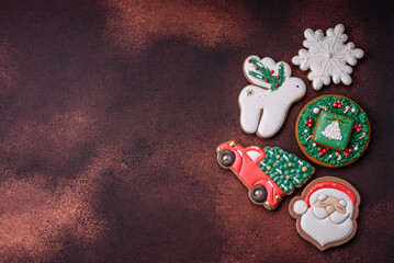 Beautiful delicious Christmas gingerbread on a concrete texture background