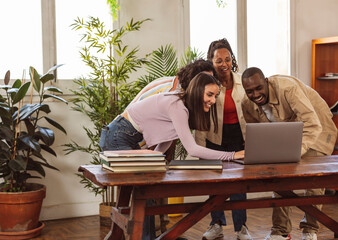 group of students with computer in class, multiracial coworkers in modern office working on computer