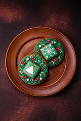 Beautiful delicious Christmas gingerbread on a concrete texture background