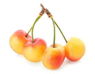 Sweet yellow cherries on white background
