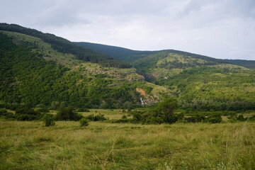 landscape with mountains and clouds in the summer