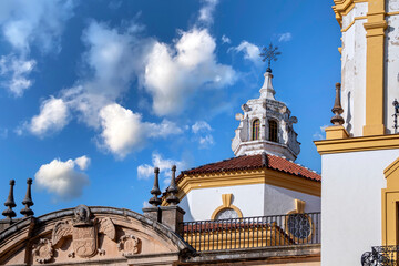 Detail view of part of the tower and the roof Parroquia de Nuestra Señora del Rosario de Ronda, Malaga, Spain