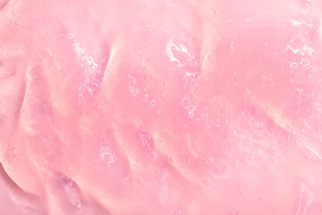 Cosmetic gel, serum transparent sample. Liquid cream with bubble texture. Gel texture of a cosmetic product. Clear liquid lotion for skin care.