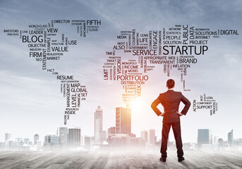 Motivation and inspiration concept with modern cityscape and businessman observing it