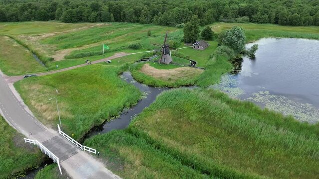 Aerial views at national park Weerribben Overijssel Netherlands. Steenwijkerland. Peatfields. Canals. Kalenberg. Winmill 