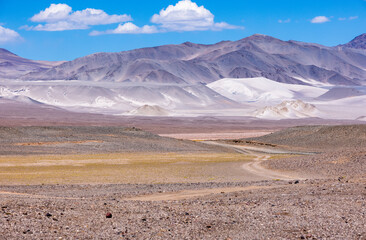 Puna - off road adventure on the way to the Campo de Piedra Pómez, a bizarre but beautiful landscape with a field of pumice, volcanic rocks and dunes of sand in the north of Argentina, South America 