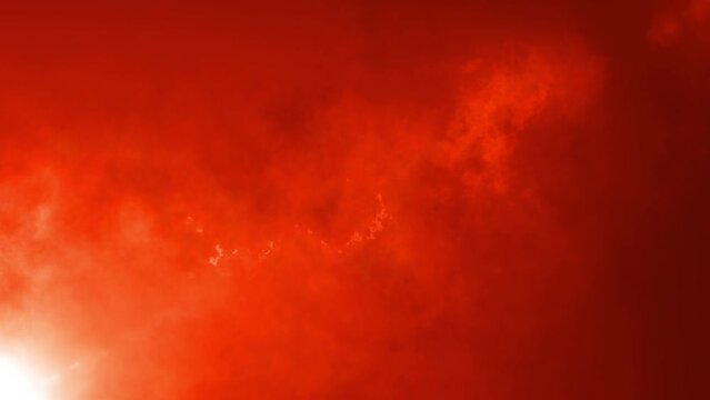 Abstract loop orange red optical flare light smoke cloud fire particles flow from bottom left to top right effect animation on black background. 4K 3D atmosphere soft fog,smoke,loud with dust on dark