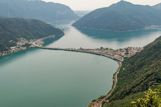 Panoramic aerial view, from the top of San Salvatore mountain, on Lake Lugano and surroundings, Switzerland