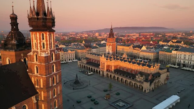 krakow city old town aerial view drone at sunrise,flying over saint mary basilica market square 