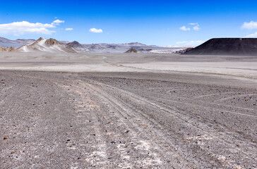 Puna - off road adventure on the way to the Campo de Piedra Pómez, a bizarre but beautiful landscape with a field of pumice, volcanic rocks and dunes of sand in the north of Argentina, South America 