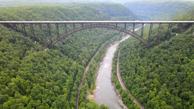 bridge over a gorge and river in New River Gorge National Park and Preserve in West Virginia. Taken from a bird's eye view.