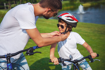 Dad and son cycling