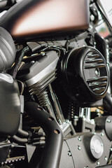 Fototapeta na wymiar Close up of the engine of a modern chopper motorbike.