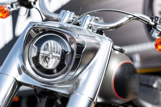 Close up of a Harley Davidson motorcycle headlight.