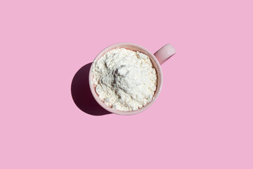 protein in a pink cup