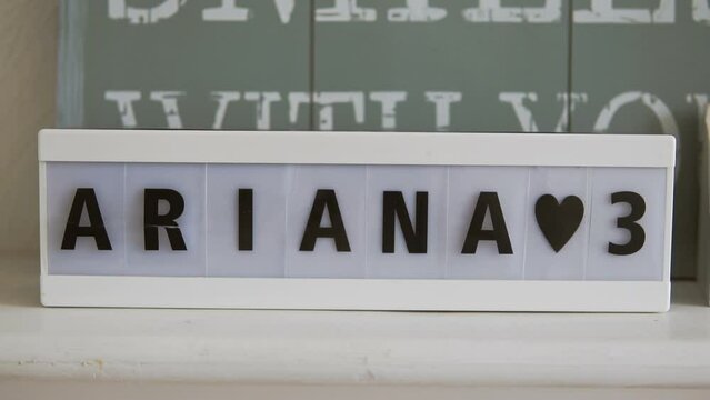 Ariana heart 3. A plate with a female name and the number three. Celebrating a child's 3rd birthday. Girl's birthday.