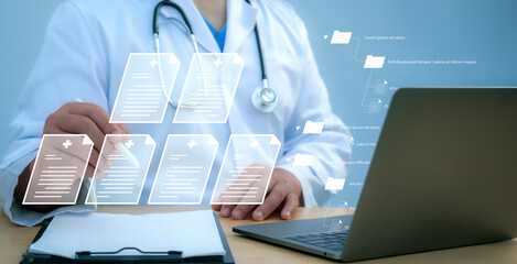 A medical worker works with an electronic database and documents.Technology and access information, database, storage, Digital link tech, big data