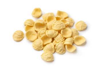 Heap of uncooked Orecchiette pasta close up isolated on white background