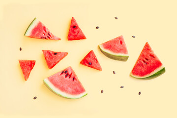 Watermelon fruit sliced isolated on yellow background, Organic fruit, Watermelon pieces
