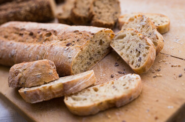 fresh loaf of bread on wooden board