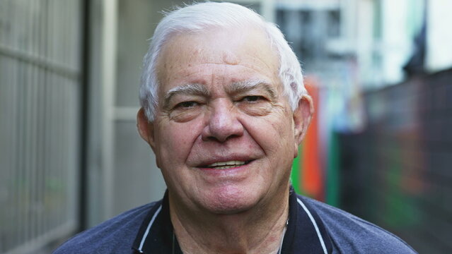 Portrait Of An Elderly Senior Man Looking At Camera, Close-up Face Of An Older Male Caucasian Person In 70s