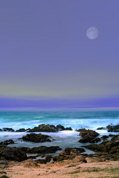 Moon setting Asilomar State Marine Reserve California