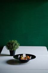 fresh salad in the restaurant on the table