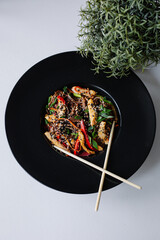 wok funchose with chicken and vegetables
