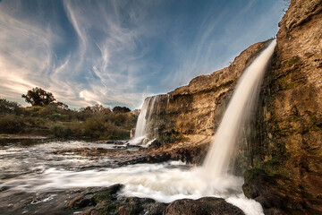 Fototapeta na wymiar Waterfall on a river in Entre Rios, Argentina