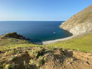 Fototapeta na wymiar Hide angle view of Blue bay (Mavi Koy) seascape next to Gokceada Yildiz Bay underwater national park. Imbros island, Canakkale, Turkey