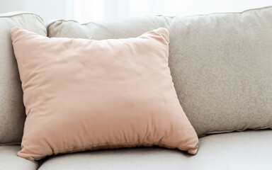 Blank soft pillow on cozy couch MADE OF AI