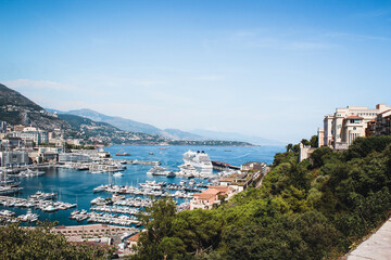 Fototapeta na wymiar Panoramic view of port in Monaco, luxury yachts in a row