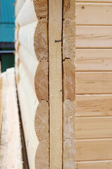 Cutting of profiled beam walls, blanks for windows and doors, construction of new rural house