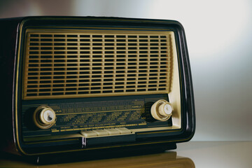 Fototapeta premium Classic analogue table radio, visible the scale with the names of the world capitals for tuning frequencies.
